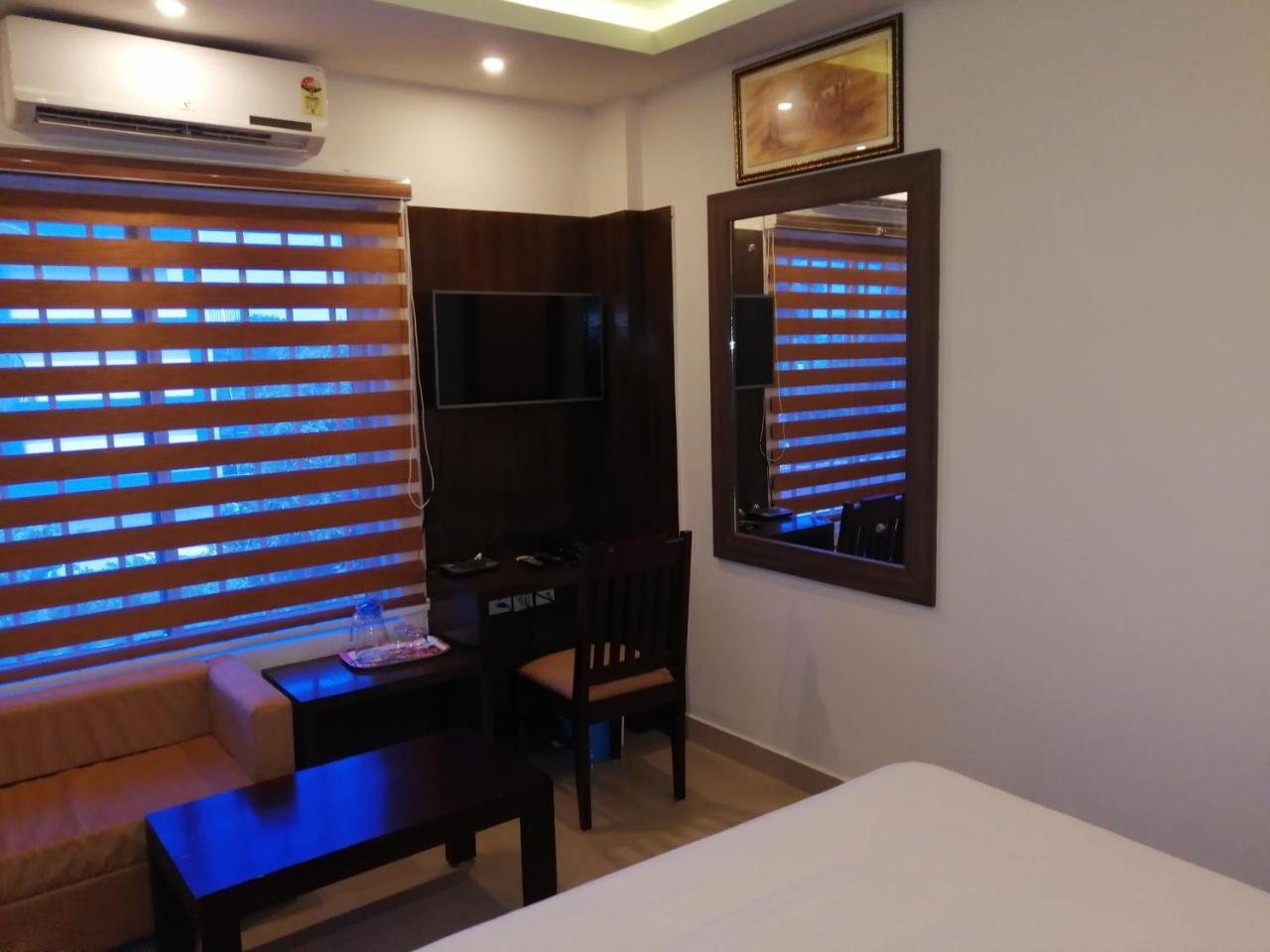 The Orchid Suites Kollam Buitenkant foto